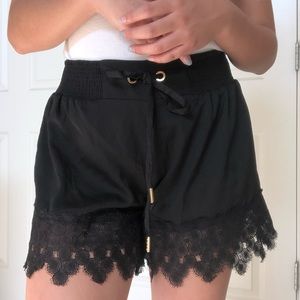 BEBE Lace Flounce shorts